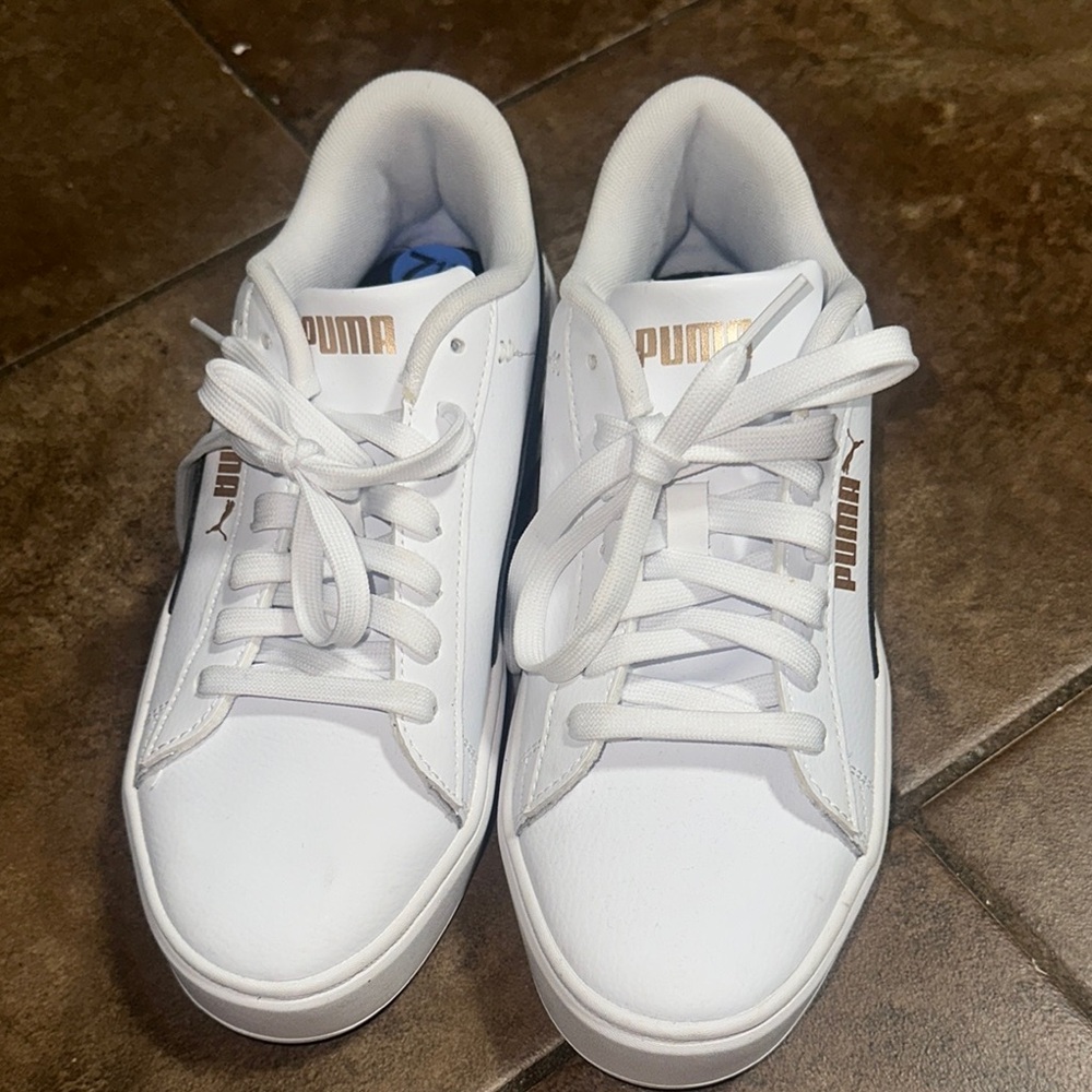 Puma White and Black Sneakers with Gold Accents